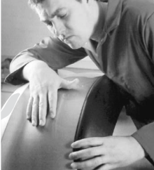 Refinish the entire component to make the plastic repair invisible.